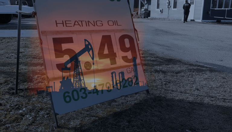 A double exposure image showing a heating oil price sign with an oil pump derrick against a sunset over a desert landscape.